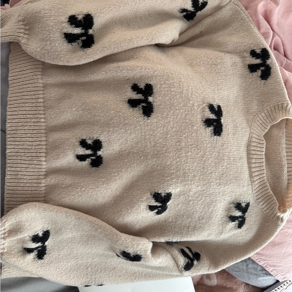 Cozy Cream Sweater with Black Accents
